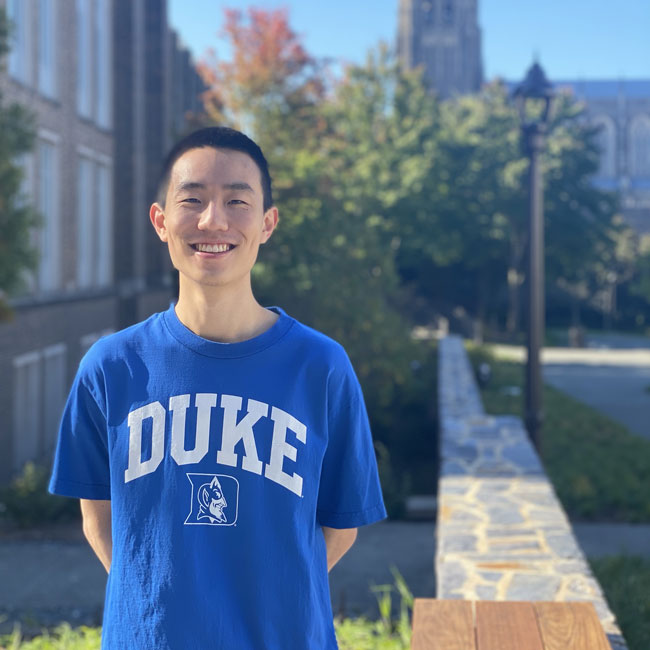 image of Philip in front of Chapel wearing Duke shirt
